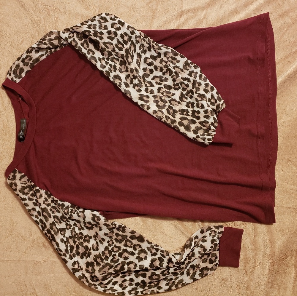 Burgandy shirt with sheer leopard print sleeves